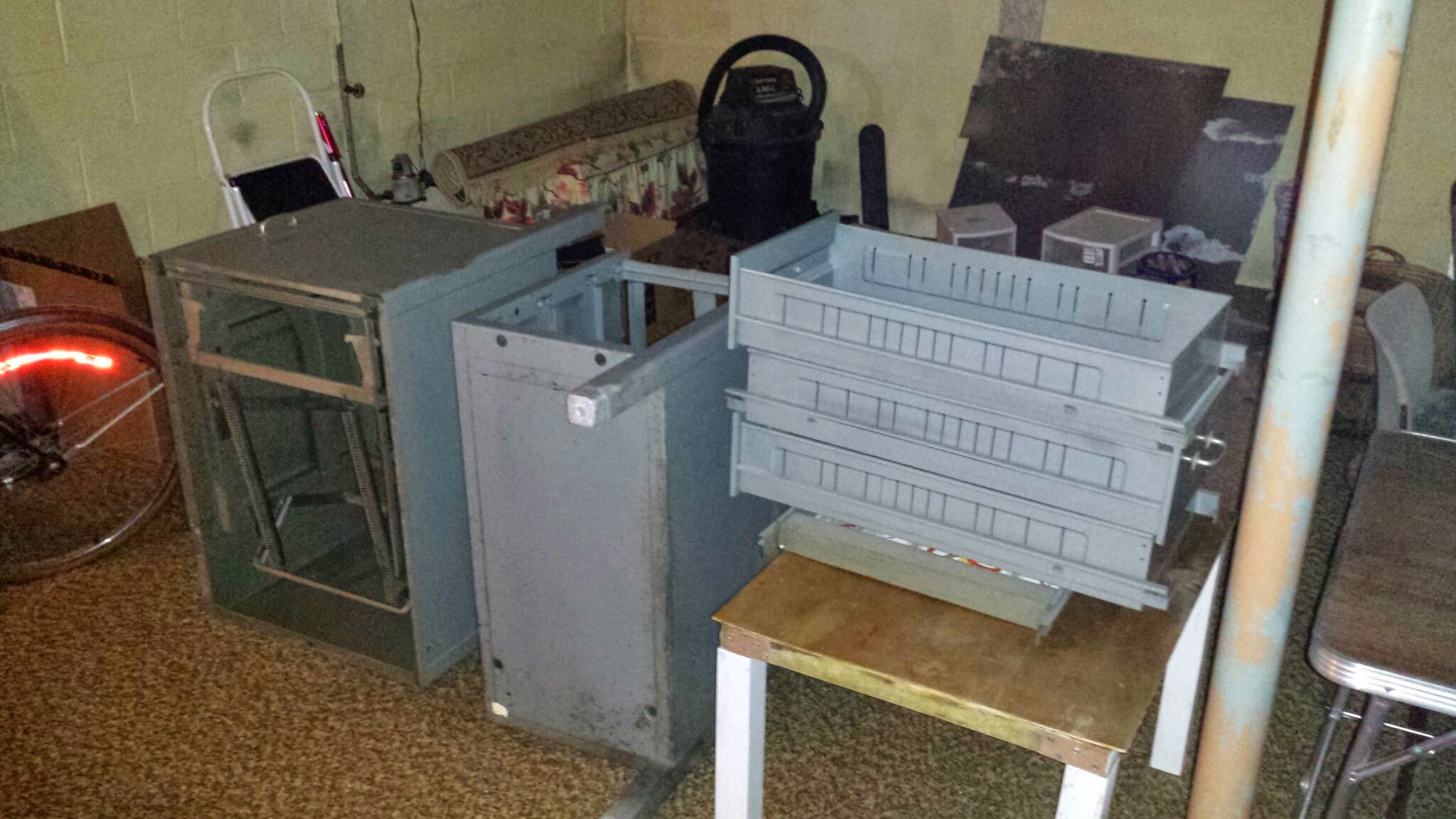 Desk disassembled parts in room