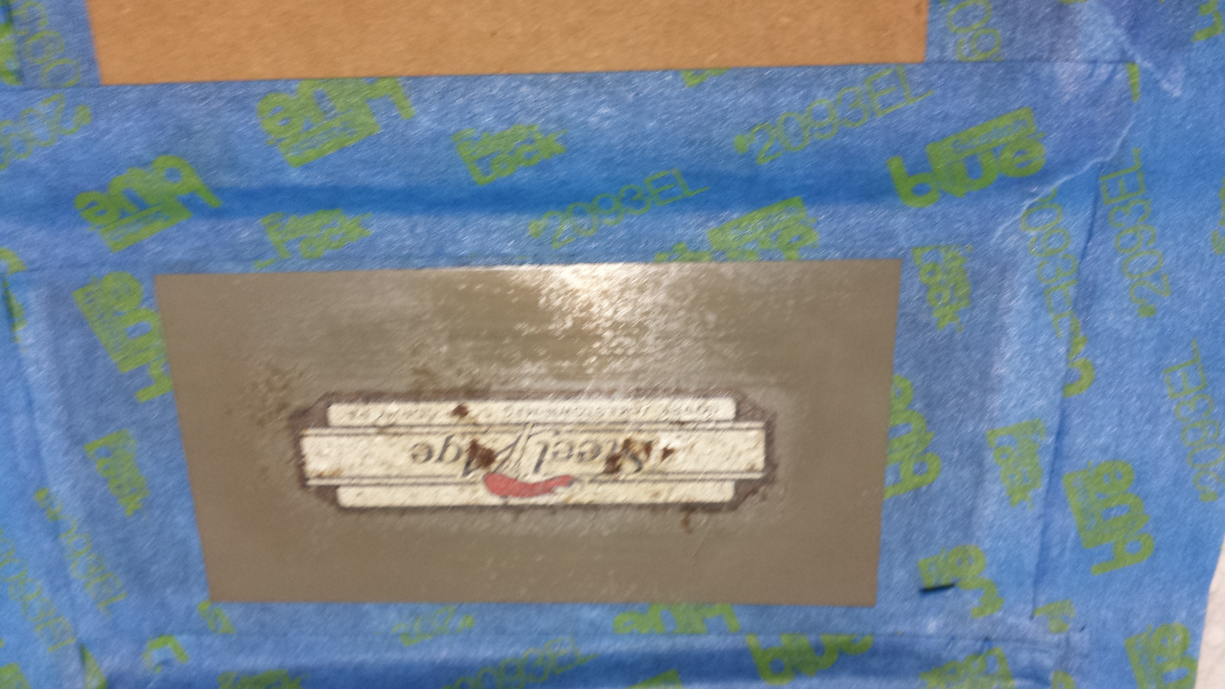 Masked nameplate before paint