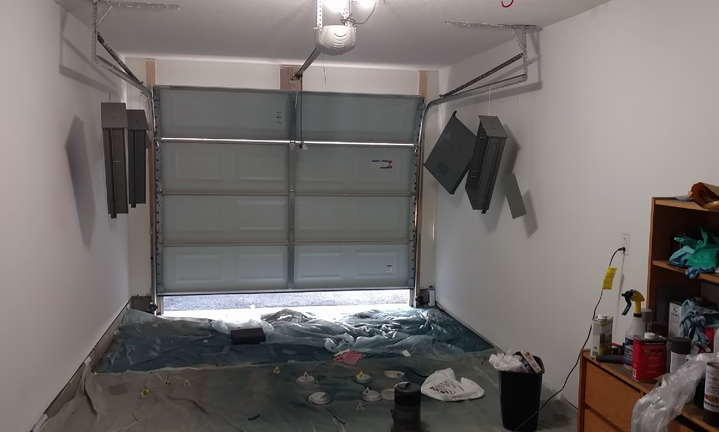 Painted parts hanging in garage