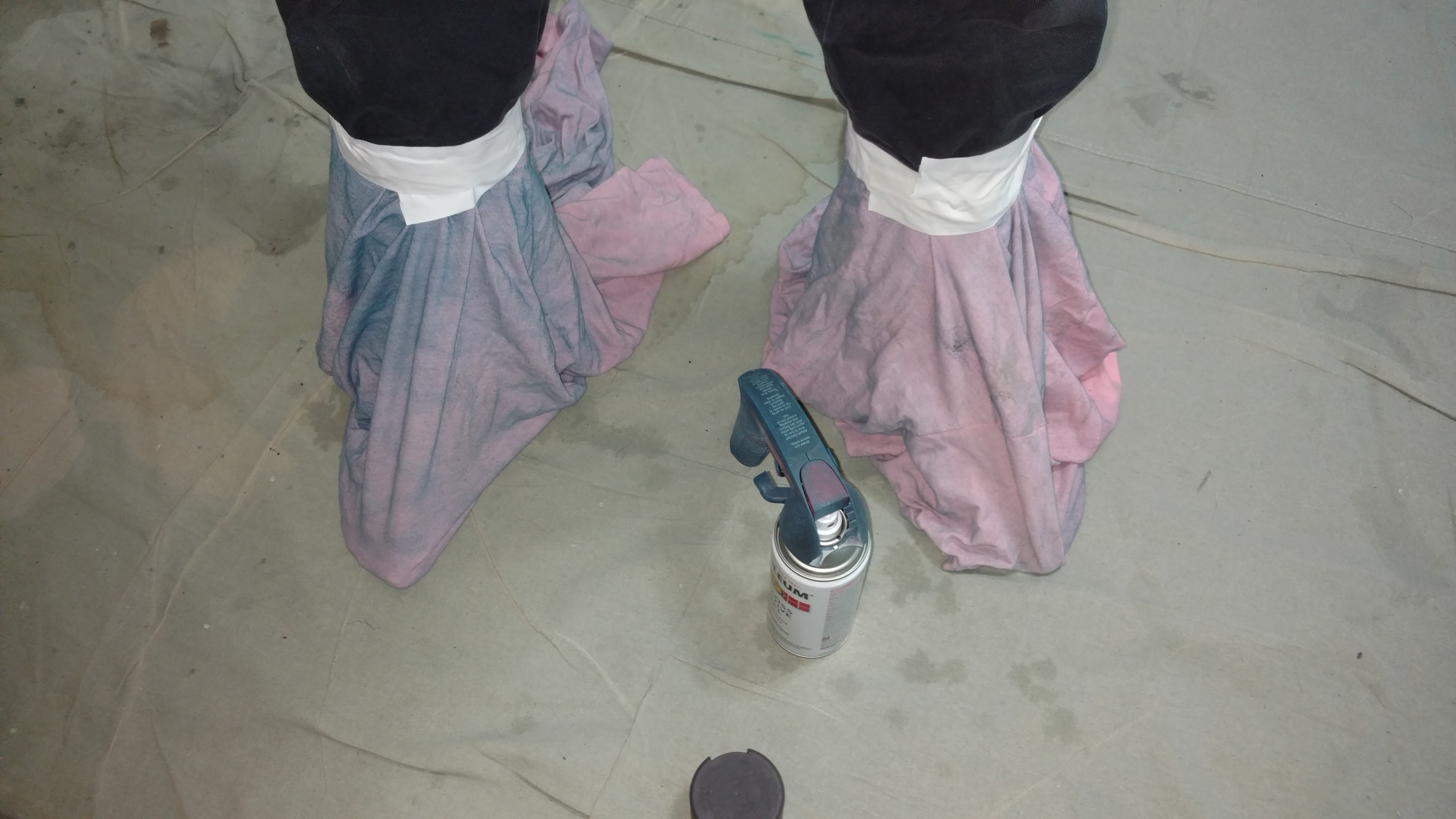 Shoe covers and paint can